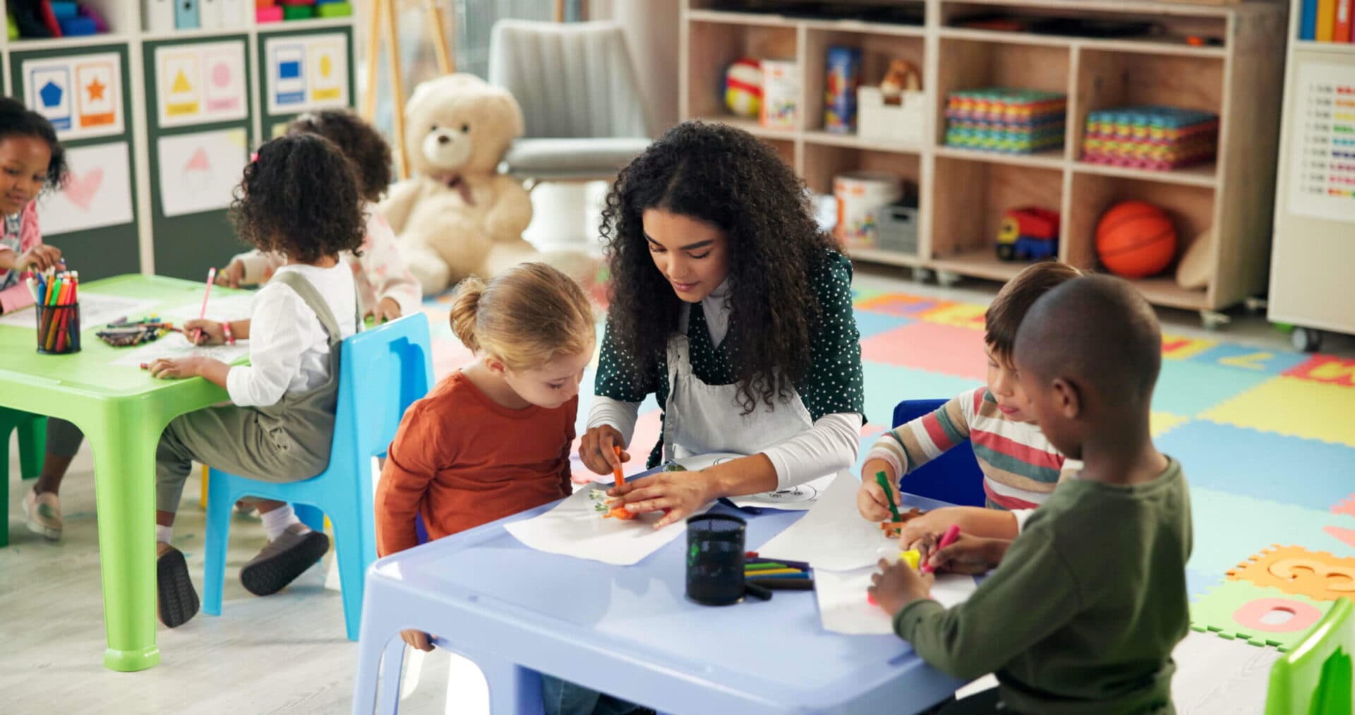 A Peyton’s Learning Place teacher working with children